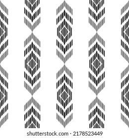 el patrón tribal de ikat se rayó sin fisuras. Diseño de fondo geométrico blanco-negro para ropa, envoltura, tela, estilo de bordado de ilustración vectorial.