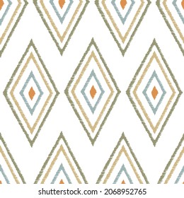 Ikat tye die boho vintage pattern seamless repeat vintage decor textile design organic hand made batik modern and trendy boho print orange blue green brown