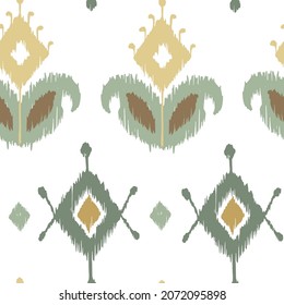 Ikat tye die boho vintage pattern seamless repeat vintage decor textile design organic hand made batik modern and trendy boho print green brown yellow