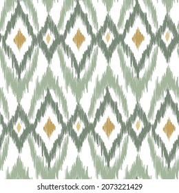 Ikat tye die boho vintage pattern seamless repeat vintage decor textile design organic hand made batik modern and trendy boho print green brown yellow