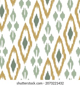 Ikat tye die boho vintage pattern seamless repeat vintage decor textile design organic hand made batik modern and trendy boho print green brown yellow