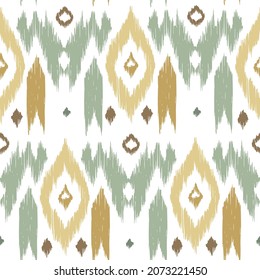 Ikat tye die boho vintage pattern seamless repeat vintage decor textile design organic hand made batik modern and trendy boho print green brown yellow