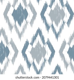 Ikat tye die boho vintage pattern seamless repeat vintage decor textile design organic hand made batik modern and trendy boho print blue grey white