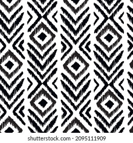 Ikat tye die boho vintage pattern seamless repeat vintage decor textile design organic hand made batik modern and trendy boho print black white