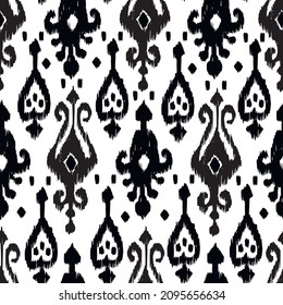 Ikat tye die boho vintage pattern seamless repeat vintage decor textile design organic hand made batik modern and trendy boho print black white