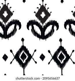 Ikat tye die boho vintage pattern seamless repeat vintage decor textile design organic hand made batik modern and trendy boho print black white