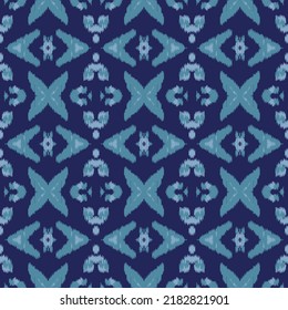 ikat vector Indigo navy color ethical tribal hand - drawn pattern Navajo motif for packing, wallpaper, batik. blue