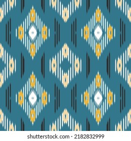 Ikat vector seamless pattern in tribal, folk embroidery, Mexican style. Ikat Aztec geometric art ornament. Design for Print carpet, wallpaper, clothing, wrapping, fabric, cover.