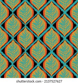 Ikat.Seamless pattern of leaf shape.Embroidery abstract background.Image for carpet,quilt,shawl,pillow.Vector.Illustration. 