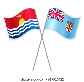 I-Kiribati and Fijian crossed flags. Kiribati combined with Fiji isolated on white. Language learning, international business or travel concept.