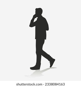 ilhouette of man walking while calling