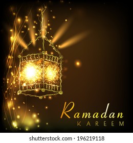 Illuminated arabic lantern on shiny brown background for celebration of holy month of muslim community Ramadan Kareem. 