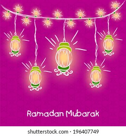 Linterna árabe iluminada con brillantes antecedentes rosas para el mes sagrado de la comunidad musulmana Ramadan Kareem.
