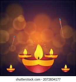 illuminated diyas Oil Lamps, Fireworks (Rocket) with abstract background for Diwali celebration.