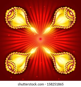 Illuminated golden oil lit lamps on red background for occasion of Indian festival of lights, Shubh Deepawali (Happy Deepawali).