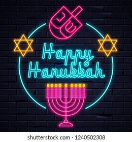 Illuminated neon signs Happy Hanukkah  holiday light electric banner glowing on black brickwall. Neons sign billboard design template with traditional Jewish candles, Menorah, Magen David Star,dreidel