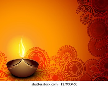 Illuminated oil lamp on beautiful floral decorative background for Diwali festival celebration in India. EPS 10.