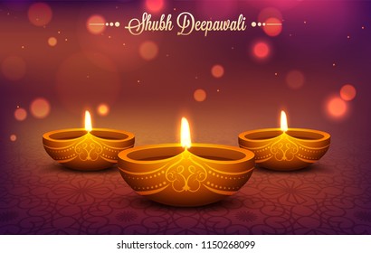 Illuminated oil lamps (Diya) on shiny bokeh effect background for Shubh Deepavali festival celebration concept.