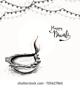 Illuminated oil lit lamp, sketching, Happy Diwali celebrations.