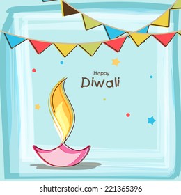 Illuminated oil lit lamp and stylish decoration for Diwali celebration on stylish sky blue background.