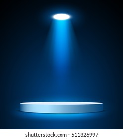 Illuminated round stage podium on dark background