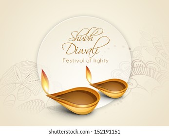 Illuminated tradition oil lit lamps on floral decorated background on occasion of Diwali festival celebration in India. 
