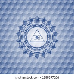 illuminati pyramid icon inside blue emblem with geometric pattern.