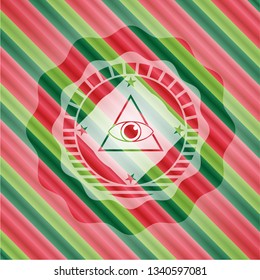 illuminati pyramid icon inside christmas badge.