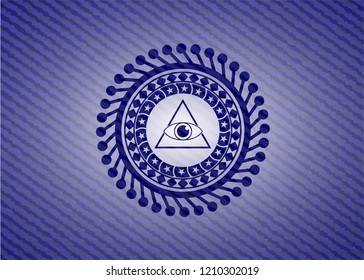 illuminati pyramid icon inside emblem with jean texture