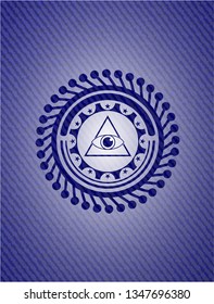 illuminati pyramid icon inside emblem with jean texture