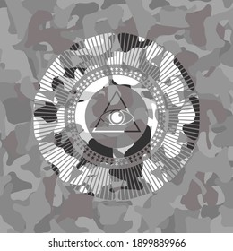 illuminati pyramid icon inside grey camouflage texture. 