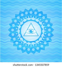 illuminati pyramid icon inside light blue water badge background.