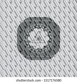 illuminati pyramid icon inside silver shiny badge. Scales pattern. Vector Illustration. Detailed.