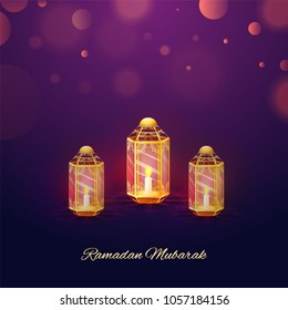 Illuminating lanterns on purple background, Ramadan Mubarak concept. 
