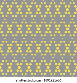 Illuminating yellow and ultimate gray geometric seamless rhombus pattern. Abstract diamond vector pattern of dots. Simple vector illustration. Geometric design for fabric, wallpaper, scrapbooking