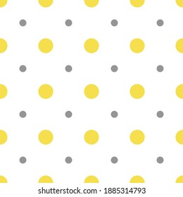Illuminating yellow and ultimate gray seamless polka dot pattern, vector illustration. Seamless pattern with yellow and gray circles on white. Abstract geometric polka dots background