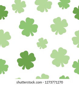 Illustrated seamless design pattern of a four leaf clover against a white background.