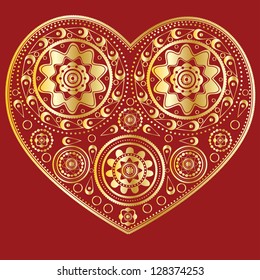 Illustration of abstract golden ornamental heart on red background.