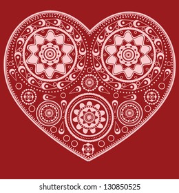 Illustration of abstract ornamental heart on red background.