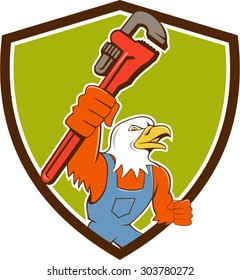 Illustration of an american bald eagle plumber holding monkey wrench looking to the side set inside shield crest done in cartoon style. 