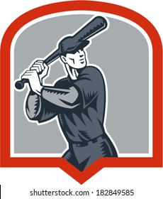 Illustration of a american baseball player batter batting set inside shield crest shape done in retro woodcut style isolated on white background.