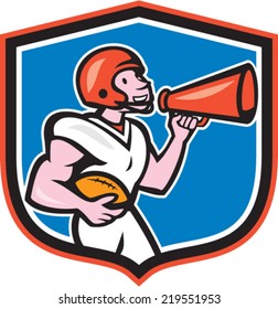 Illustration of an american football gridiron quarterback player holding bullhorn blowhorn shouting facing side set inside crest shield on isolated background done in cartoon style.