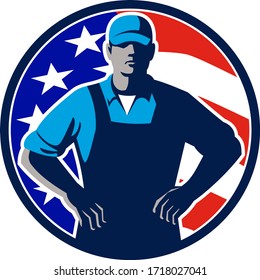 Illustration of an American organic farmer wearing hat and overalls with hands on hips akimbo and USA stars and stripes flag set in circle on isolated background done in retro style. 