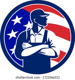 Illustration of an American organic farmer wearing hat and overalls arms folded looking to the side with USA stars and stripes flag set inside circle done in retro style. 