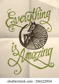 Illustration of armadillo with "Everything is amazing" hand drawn quote on the textured paper background