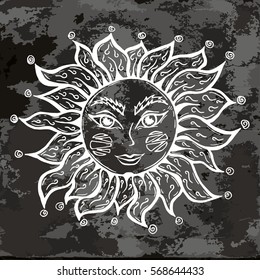 Illustration with beautiful hand drawn white sun symbol on black vintage paper. Invitation element. Tattoo design.