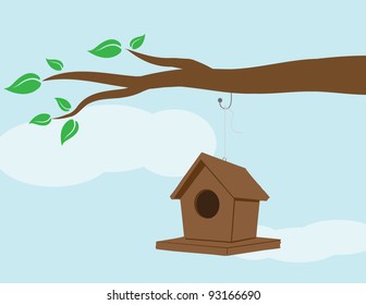 Illustration of a birdhouse hanging on a branch.