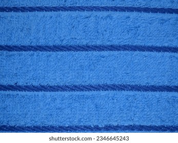Illustration Blue knitted background in a stripe. Blue striped background. Background Knitted Terry Cloth Striped Blue
