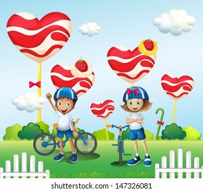 Illustration of a boy and a girl biking near the giant lollipops