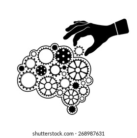 Illustration of a brain like a mechanism with gears. Hand of human adjusts gear